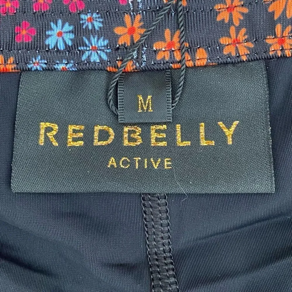 NWT New Redbelly Flip Skort Wildflower Pattern. Medium Pickleball/Athleisure